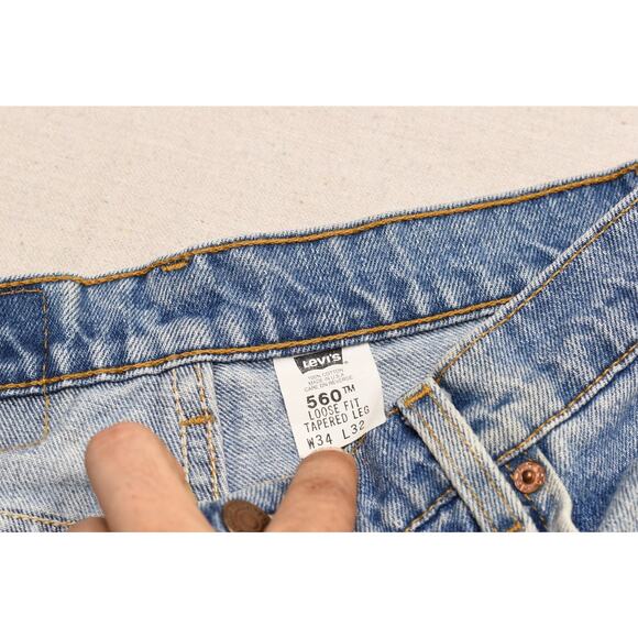 Vintage Levi's 560 Loose Fit Tapered Leg Jeans Men's 34x32 W/ Stains USA Made - Picture 2 of 8